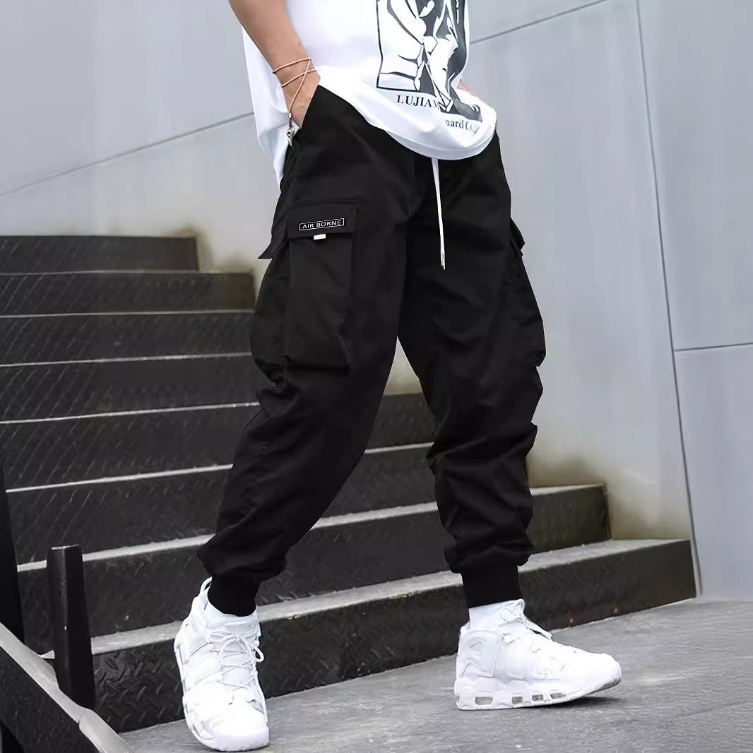 Streetwear men’s cargo pants with stretch‑fit fabric and elastic waist  