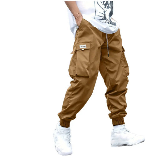 Side view of men’s multi pocket cargo pants in durable nylon poly fabric  