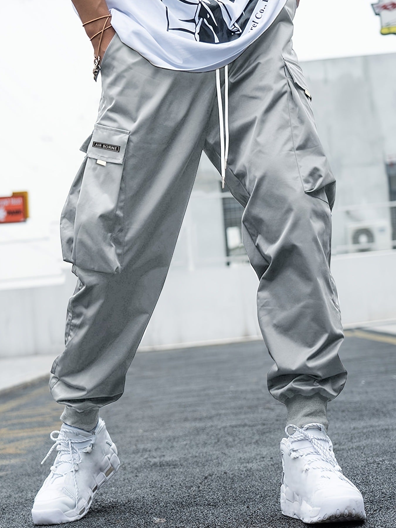 Full‑body view of UrbanFlex cargo pants styled with casual outfit
