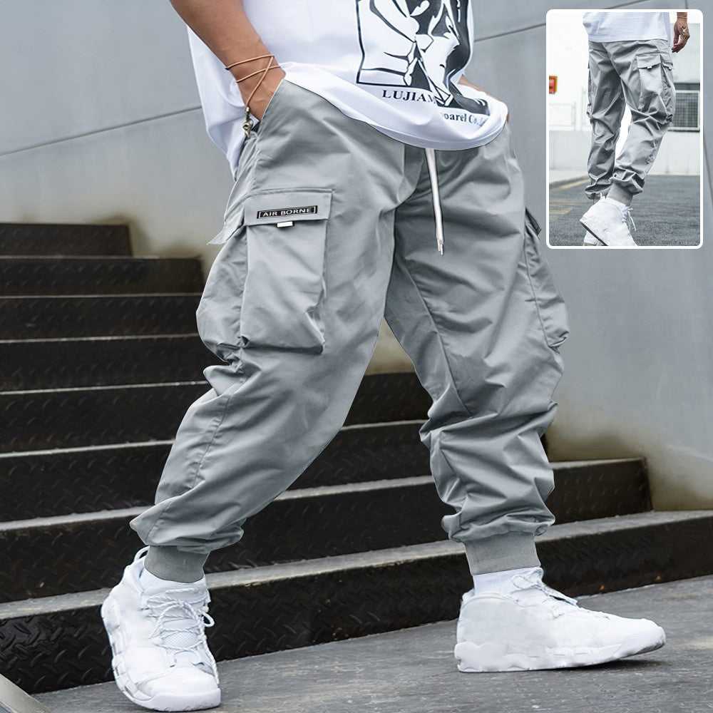 Men’s UrbanFlex cargo pants in black with multi‑pocket utility design  