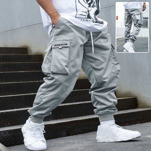 Men’s UrbanFlex cargo pants in black with multi‑pocket utility design  