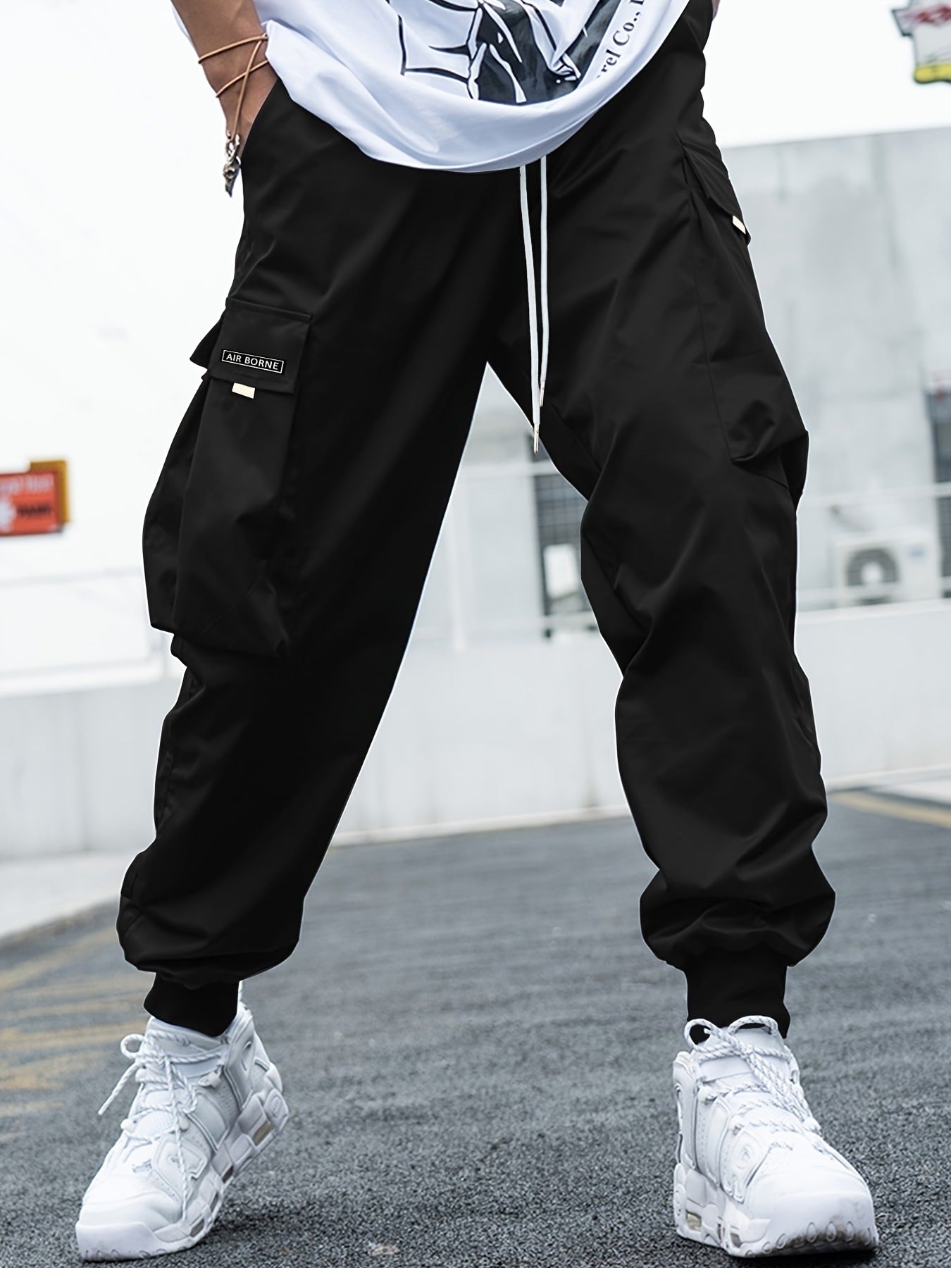 Men’s nylon‑poly blend cargo pants with side pockets and tapered fit 
